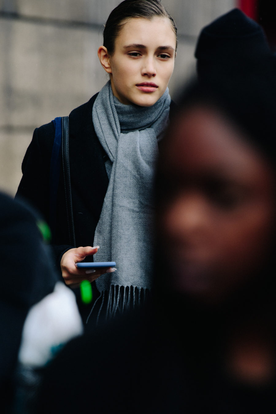 Model wearing grey scarf