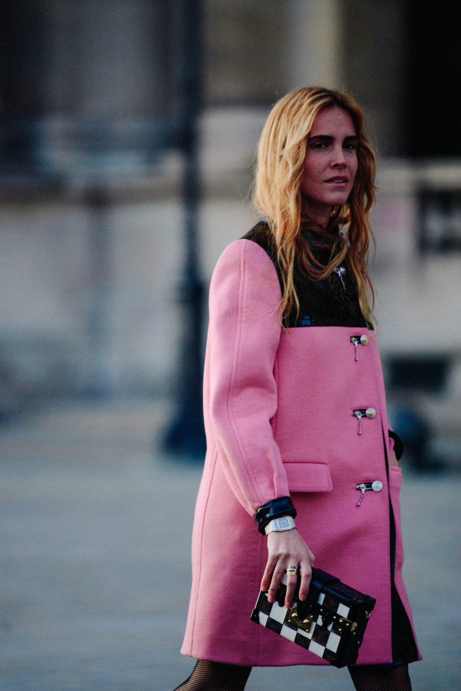Woman wearing pink coat