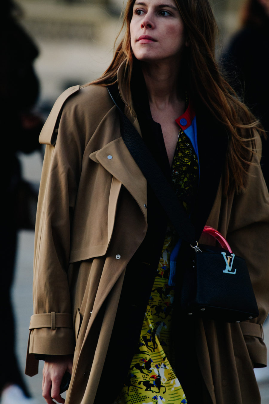Woman wearing brown coat