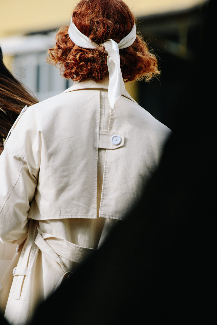 Man wearing white coat
